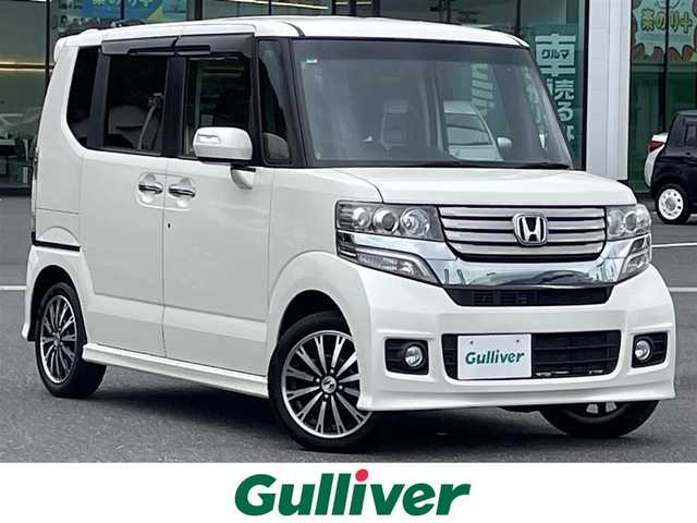 ホンダ Ｎ ＢＯＸ カスタム ターボ SSパッケージ 東京都 2013(平25)年 6.4万km プレミアムホワイトパール 登録時走行距離63972km/社外ナビ/フルセグTV/AM/FM/CD/DVD/BT/バックカメラ/両側パワースライドドア/ETC/クルーズコントロール/オートライト/HIDライト/フォグランプ/社外ドアバイザー/無限フロアマット/スペアキー/昭島店成約