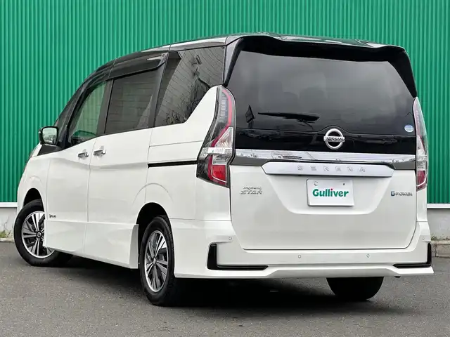 日産 セレナ e－パワー ハイウェイスター V 宮城県 2021(令3)年 7.1万km ブリリアントホワイトパール 2トーン セーフティパックA/・SRSエアバッグ（サイド/カーテン）/・インテリジェントアラウンドビューモニター/・インテリジェントルームミラー/・ふらつき警報/寒冷地仕様/・ヒーター付ドアミラー/・ステアリングヒーター/・3列目ヒーターダクト/・リアオートエアコン/・シートヒーター（運転席/助手席）/＝＝＝/インテリジェントエマージェンシーブレーキ/踏み間違い衝突防止アシスト/車線逸脱防止支援システム/車線逸脱警報/後側方衝突防止支援システム/後側方車両検知警報/後退時車両検知警報/前方衝突予測警報/標識検知機能/プロパイロット/純正フリップダウンモニター/純正10インチナビ/・CD/DVD/・Blu-ray/・Bluetooth/・フルセグTV/ビルトインETC/ドライブレコーダー/ハンズフリーパワースライドドア（両側）/革巻きステアリング/電動パーキングブレーキ/ブレーキホールド/アダプティブLEDヘッドランプ/スマートキー＆プッシュスタート/電動格納ミラー/純正15インチAW/純正フロアマット