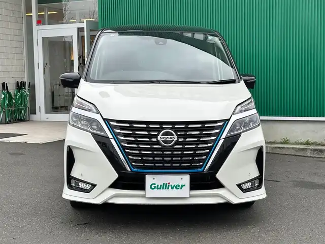 日産 セレナ e－パワー ハイウェイスター V 宮城県 2021(令3)年 7.1万km ブリリアントホワイトパール 2トーン セーフティパックA/・SRSエアバッグ（サイド/カーテン）/・インテリジェントアラウンドビューモニター/・インテリジェントルームミラー/・ふらつき警報/寒冷地仕様/・ヒーター付ドアミラー/・ステアリングヒーター/・3列目ヒーターダクト/・リアオートエアコン/・シートヒーター（運転席/助手席）/＝＝＝/インテリジェントエマージェンシーブレーキ/踏み間違い衝突防止アシスト/車線逸脱防止支援システム/車線逸脱警報/後側方衝突防止支援システム/後側方車両検知警報/後退時車両検知警報/前方衝突予測警報/標識検知機能/プロパイロット/純正フリップダウンモニター/純正10インチナビ/・CD/DVD/・Blu-ray/・Bluetooth/・フルセグTV/ビルトインETC/ドライブレコーダー/ハンズフリーパワースライドドア（両側）/革巻きステアリング/電動パーキングブレーキ/ブレーキホールド/アダプティブLEDヘッドランプ/スマートキー＆プッシュスタート/電動格納ミラー/純正15インチAW/純正フロアマット