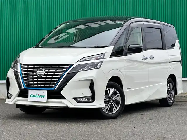 日産 セレナ e－パワー ハイウェイスター V 宮城県 2021(令3)年 7.1万km ブリリアントホワイトパール 2トーン セーフティパックA/・SRSエアバッグ（サイド/カーテン）/・インテリジェントアラウンドビューモニター/・インテリジェントルームミラー/・ふらつき警報/寒冷地仕様/・ヒーター付ドアミラー/・ステアリングヒーター/・3列目ヒーターダクト/・リアオートエアコン/・シートヒーター（運転席/助手席）/＝＝＝/インテリジェントエマージェンシーブレーキ/踏み間違い衝突防止アシスト/車線逸脱防止支援システム/車線逸脱警報/後側方衝突防止支援システム/後側方車両検知警報/後退時車両検知警報/前方衝突予測警報/標識検知機能/プロパイロット/純正フリップダウンモニター/純正10インチナビ/・CD/DVD/・Blu-ray/・Bluetooth/・フルセグTV/ビルトインETC/ドライブレコーダー/ハンズフリーパワースライドドア（両側）/革巻きステアリング/電動パーキングブレーキ/ブレーキホールド/アダプティブLEDヘッドランプ/スマートキー＆プッシュスタート/電動格納ミラー/純正15インチAW/純正フロアマット