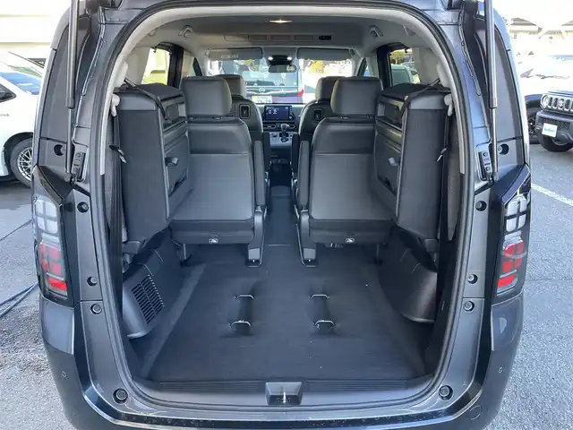 ホンダ フリード ハイブリット e:HEV AIR EX 東京都 2025(令7)年 0.1千km メテオロイドグレーメタリック 登録済未使用車　/純正9型メモリナビフルセグ/BluetoothAudio/USB/AppleCarPlay/AndroidAuto/両パワ－スライドドア　/リアサーキュレーター/ＬＥＤヘッドライト　/ホンダセンシング　/オートハイビーム　/歩行者事故低減ステアリング　/アダプティブクルーズコントロール　/パーキングセンサ-/ブラインドスポットモニター/衝突軽減ブレーキ/誤発進抑制機能/近距離衝突軽減ブレーキ/路外逸脱抑制機能/プッシュエンジンスタート/保証書＆取説/Wエアバック＆ABS