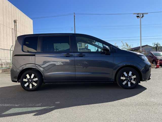 ホンダ フリード ハイブリット e:HEV AIR EX 東京都 2025(令7)年 0.1千km メテオロイドグレーメタリック 登録済未使用車　/純正9型メモリナビフルセグ/BluetoothAudio/USB/AppleCarPlay/AndroidAuto/両パワ－スライドドア　/リアサーキュレーター/ＬＥＤヘッドライト　/ホンダセンシング　/オートハイビーム　/歩行者事故低減ステアリング　/アダプティブクルーズコントロール　/パーキングセンサ-/ブラインドスポットモニター/衝突軽減ブレーキ/誤発進抑制機能/近距離衝突軽減ブレーキ/路外逸脱抑制機能/プッシュエンジンスタート/保証書＆取説/Wエアバック＆ABS