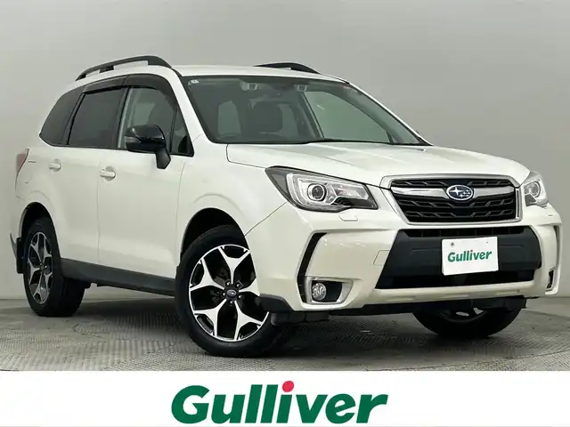 スバル フォレスター S－リミテッド スマートED 道央・札幌 2018(平30)年 7.7万km クリスタルホワイトP ・４WD/・ダイヤトーンサウンドSDナビ/　CD/DVD/SD/BT/USB/フルセグTV/・バックカメラ/・ビルトインETC2.0/・アイサイト/　衝突被害軽減ブレーキ/　レーンキープアシスト/　先行車発進お知らせ/　後退速度リミッター/　スバルリヤビークルディテクション/　全車速追従式クルーズコントロール/・アイドリングストップ/・ダウンヒルアシストコントロール/・X-MODE/・SI-DRIVE/・パドルシフト/・横滑り防止装置/・オートマチックハイビーム/・オートライト/・LEDヘッドライト/・前後フォグランプ/・ドアミラーウィンカー/・ヘッドランプウォッシャー/・ドアバイザー/・ハーフレザーシート/・D+N席シートヒーター/・ラゲッジカーゴマット/・純正１８インチAW/・プッシュスタート/・スマートキー/・スペアキー/・取/保