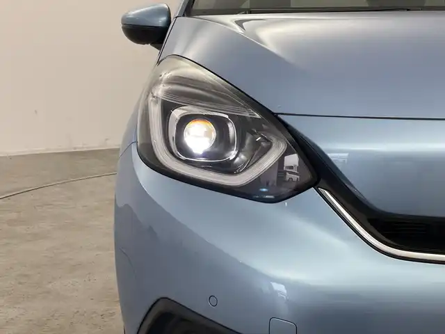 ホンダ フィット e:HEVホーム 群馬県 2020(令2)年 3.5万km ライトブルー ９型ナビ　バックカメラ　ワイヤレス充電器　ハーフレザーシート　衝突被害軽減ブレーキ　レーンアシスト　革巻きステアリング　ＬＥＤ　ＥＴＣ　アダプティブクルーズコントロール　オートマチックハイビーム　禁煙