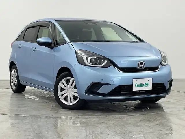 ホンダ フィット e:HEVホーム 群馬県 2020(令2)年 3.5万km ライトブルー ９型ナビ　バックカメラ　ワイヤレス充電器　ハーフレザーシート　衝突被害軽減ブレーキ　レーンアシスト　革巻きステアリング　ＬＥＤ　ＥＴＣ　アダプティブクルーズコントロール　オートマチックハイビーム　禁煙