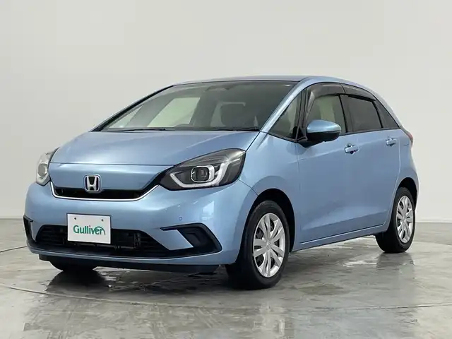 ホンダ フィット e:HEVホーム 群馬県 2020(令2)年 3.5万km ライトブルー ９型ナビ　バックカメラ　ワイヤレス充電器　ハーフレザーシート　衝突被害軽減ブレーキ　レーンアシスト　革巻きステアリング　ＬＥＤ　ＥＴＣ　アダプティブクルーズコントロール　オートマチックハイビーム　禁煙