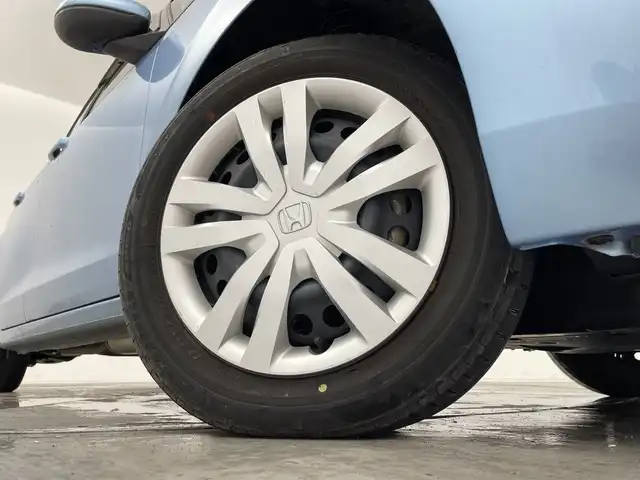 ホンダ フィット e:HEVホーム 群馬県 2020(令2)年 3.5万km ライトブルー ９型ナビ　バックカメラ　ワイヤレス充電器　ハーフレザーシート　衝突被害軽減ブレーキ　レーンアシスト　革巻きステアリング　ＬＥＤ　ＥＴＣ　アダプティブクルーズコントロール　オートマチックハイビーム　禁煙