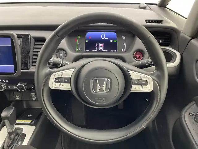 ホンダ フィット e:HEVホーム 群馬県 2020(令2)年 3.5万km ライトブルー ９型ナビ　バックカメラ　ワイヤレス充電器　ハーフレザーシート　衝突被害軽減ブレーキ　レーンアシスト　革巻きステアリング　ＬＥＤ　ＥＴＣ　アダプティブクルーズコントロール　オートマチックハイビーム　禁煙