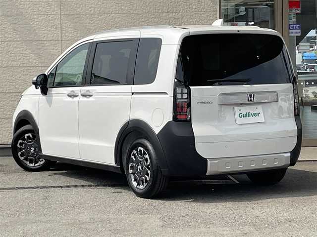 ホンダ フリード クロスター 兵庫県 2025(令7)年 0.1万km未満 プラチナホワイトパール 登録済未使用車/両側パワースライドドア/衝突軽減ブレーキ/レーダークルーズコントロール/コーナーセンサー/ブラインドスポットモニター/ハーフレザーシート/シートヒーター/電動パーキングブレーキ/オートホールド/革巻きステアリング/ステアリングリモコン/スマートキー/スペアキー/電動格納ミラー
