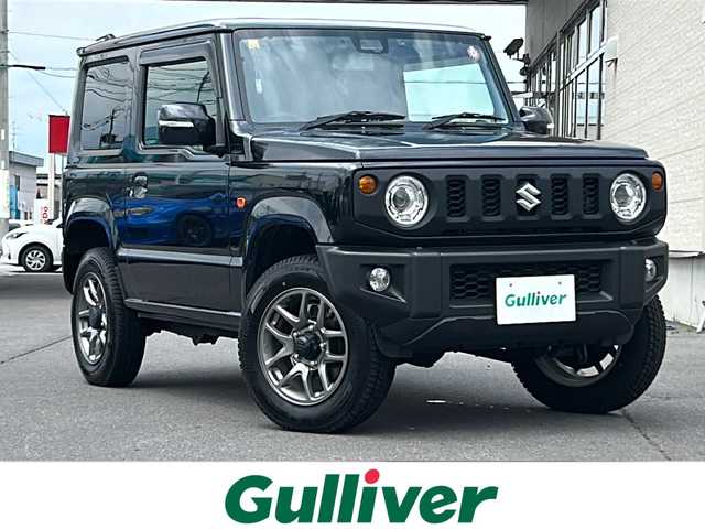 スズキ ジムニー XC 道北・旭川 2023(令5)年 1.4万km ブルーイッシュブラックパール3 ・ワンオーナー/・4WD/・禁煙車///スズキセーフティサポート///・標識認識機能/・車線逸脱警報機能/・ふらつき警報機能/・先行発車お知らせ機能/・ハイビームアシスト/・デュアルセンサーブレーキサポート/・ヒルディセントコントロール/・クルーズコントロール/・オートライト/・シートヒーター/・LEDライト/・フォグランプ/・ヘッドライトウォッシャー/・USB/・背面タイヤ/・純正フロアマット/・保証書/・取扱説明書