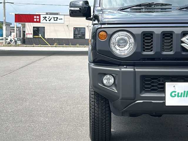 スズキ ジムニー XC 道北・旭川 2023(令5)年 1.4万km ブルーイッシュブラックパール3 ・ワンオーナー/・4WD/・禁煙車///スズキセーフティサポート///・標識認識機能/・車線逸脱警報機能/・ふらつき警報機能/・先行発車お知らせ機能/・ハイビームアシスト/・デュアルセンサーブレーキサポート/・ヒルディセントコントロール/・クルーズコントロール/・オートライト/・シートヒーター/・LEDライト/・フォグランプ/・ヘッドライトウォッシャー/・USB/・背面タイヤ/・純正フロアマット/・保証書/・取扱説明書