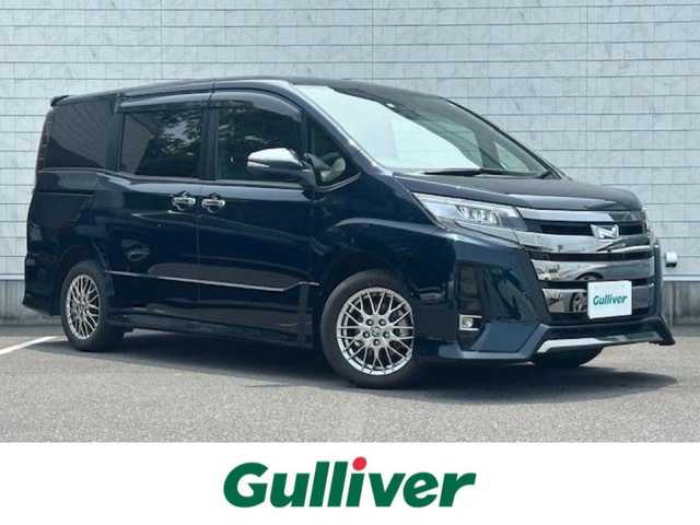 トヨタ ノア ハイブリッド Si ダブルバイビーⅢ 大阪府 2021(令3)年 2.9万km ブラッキッシュアゲハガラスフレーク 純正9型ナビ(NSZT-Y68T)/フルセグ/Bluetooth/トヨタセーフティセンス/ドライブレコーダー前後/シートヒーター前席/ハーフレザーシート/ビルトインETC/両側パワースライドドア/LEDヘッドライト/純正アルミホイール/前後コーナーセンサー/レザー調シートカバー/ステアリングスイッチ/プッシュスタート/スマートキー×２