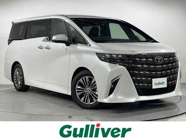 トヨタ アルファード Z 広島県 2024(令6)年 0.8万km プラチナホワイトパールマイカ 禁煙車/純正１４型ナビ/サンルーフ/温冷シート/ユニバーサルステップ/パワーシート/全周囲カメラ/デジタルインナーミラー/ステアリングヒーター/ワイヤレス充電/レーダークルーズコントロール　/オットマン/両側電動ドア/電動リア/１００Ｖ/ブラインドスポットモニター/LEDアダブティブヘッドライト/レーンキープ/踏み間違い防止/衝突軽減/ETC2.0/純正18インチアルミホイール(225/60/R18)/エアバッグ(運転席/助手席/サイド/カーテン)