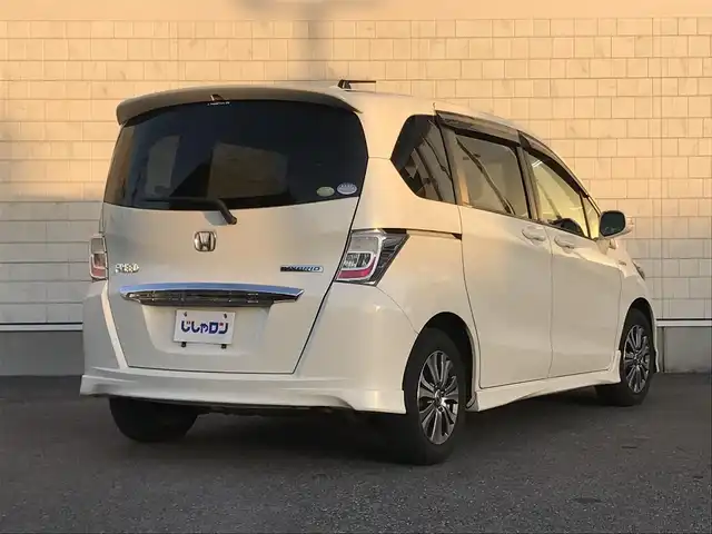 ホンダ フリード ハイブリット 栃木県 2012(平24)年 7万km プレミアムホワイトパール 株)IDOMが運営する【じしゃロン小山店】の自社ローン専用車両になります。こちらは現金またはオートローンご利用時の価格です。自社ローンご希望の方は別途その旨お申付け下さい//禁煙車/純正フルセグナビ/（CD/DVD/AM/FMラジオ）/(Bluetooth)/リモコンキー/ＥＴＣ/片側パワースライドドア/電動格納ドアミラー/パワーウインドウ/防眩ミラー