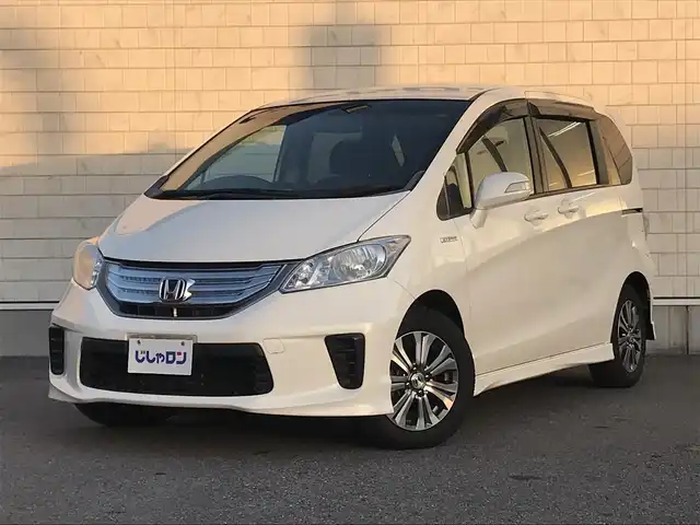 ホンダ フリード ハイブリット 栃木県 2012(平24)年 7万km プレミアムホワイトパール 株)IDOMが運営する【じしゃロン小山店】の自社ローン専用車両になります。こちらは現金またはオートローンご利用時の価格です。自社ローンご希望の方は別途その旨お申付け下さい//禁煙車/純正フルセグナビ/（CD/DVD/AM/FMラジオ）/(Bluetooth)/リモコンキー/ＥＴＣ/片側パワースライドドア/電動格納ドアミラー/パワーウインドウ/防眩ミラー