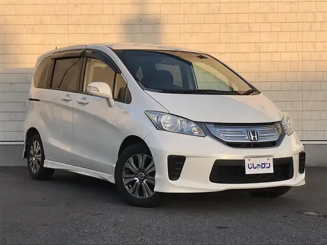 ホンダ フリード ハイブリット 栃木県 2012(平24)年 7万km プレミアムホワイトパール 株)IDOMが運営する【じしゃロン小山店】の自社ローン専用車両になります。こちらは現金またはオートローンご利用時の価格です。自社ローンご希望の方は別途その旨お申付け下さい//禁煙車/純正フルセグナビ/（CD/DVD/AM/FMラジオ）/(Bluetooth)/リモコンキー/ＥＴＣ/片側パワースライドドア/電動格納ドアミラー/パワーウインドウ/防眩ミラー