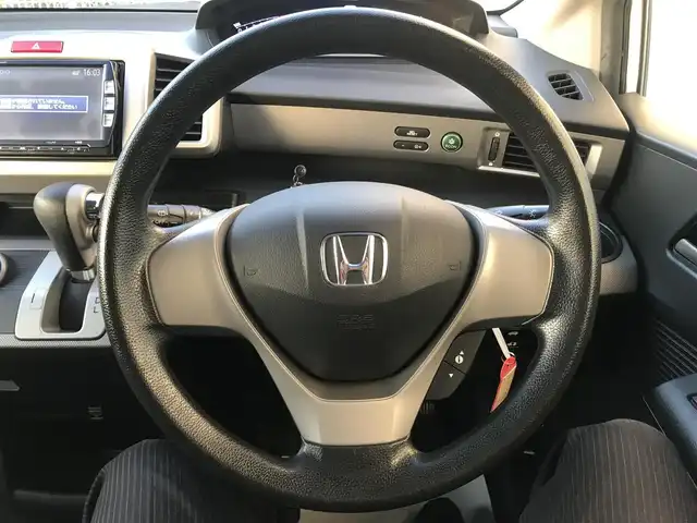 ホンダ フリード ハイブリット 栃木県 2012(平24)年 7万km プレミアムホワイトパール 株)IDOMが運営する【じしゃロン小山店】の自社ローン専用車両になります。こちらは現金またはオートローンご利用時の価格です。自社ローンご希望の方は別途その旨お申付け下さい//禁煙車/純正フルセグナビ/（CD/DVD/AM/FMラジオ）/(Bluetooth)/リモコンキー/ＥＴＣ/片側パワースライドドア/電動格納ドアミラー/パワーウインドウ/防眩ミラー