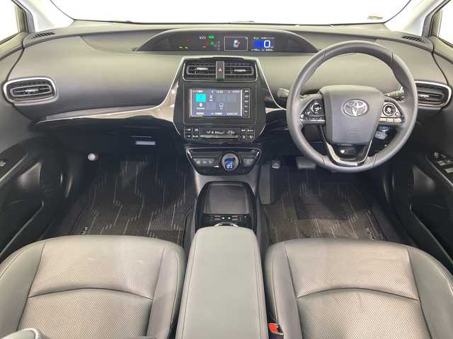 トヨタ プリウス A プレミアム 栃木県 2019(令1)年 2.3万km スティールブロンドM 純正ナビ/（CD/Bluetooth/USB/ワンセグTV）/バックカメラ/社外フルエアロ/トヨタセーフティセンス/クリアランスソナー/ブラインドスポットモニター/リヤクロストラフィックオートアラート/ヘッドアップディスプレイ/ビルトインETC/前後ドライブレコーダー/合皮シート/パワーシート/シートエアコン/シートヒーター/LEDヘッドライト/LEDフォグ/LEDデイライト/スマートキー/プッシュスタート/ステアリングスイッチ/革巻きステアリング/電動格納ミラー/純正アルミホイール/純正フロアマット