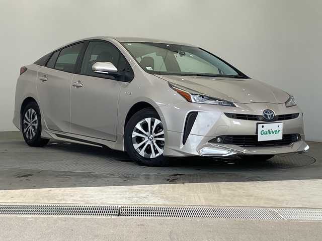 トヨタ プリウス A プレミアム 栃木県 2019(令1)年 2.3万km スティールブロンドM 純正ナビ/（CD/Bluetooth/USB/ワンセグTV）/バックカメラ/社外フルエアロ/トヨタセーフティセンス/クリアランスソナー/ブラインドスポットモニター/リヤクロストラフィックオートアラート/ヘッドアップディスプレイ/ビルトインETC/前後ドライブレコーダー/合皮シート/パワーシート/シートエアコン/シートヒーター/LEDヘッドライト/LEDフォグ/LEDデイライト/スマートキー/プッシュスタート/ステアリングスイッチ/革巻きステアリング/電動格納ミラー/純正アルミホイール/純正フロアマット