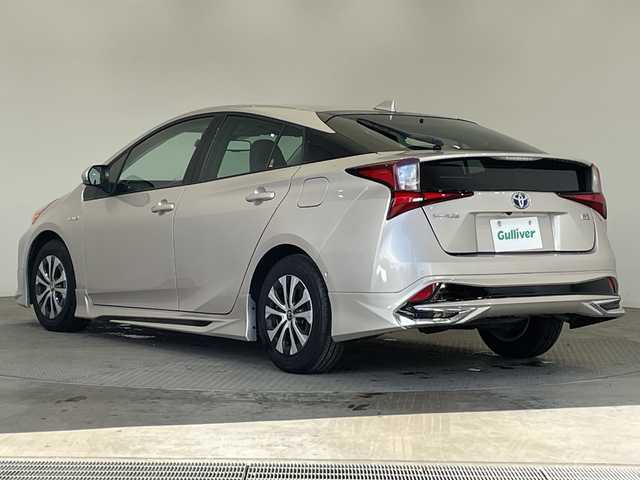 トヨタ プリウス A プレミアム 栃木県 2019(令1)年 2.3万km スティールブロンドM 純正ナビ/（CD/Bluetooth/USB/ワンセグTV）/バックカメラ/社外フルエアロ/トヨタセーフティセンス/クリアランスソナー/ブラインドスポットモニター/リヤクロストラフィックオートアラート/ヘッドアップディスプレイ/ビルトインETC/前後ドライブレコーダー/合皮シート/パワーシート/シートエアコン/シートヒーター/LEDヘッドライト/LEDフォグ/LEDデイライト/スマートキー/プッシュスタート/ステアリングスイッチ/革巻きステアリング/電動格納ミラー/純正アルミホイール/純正フロアマット