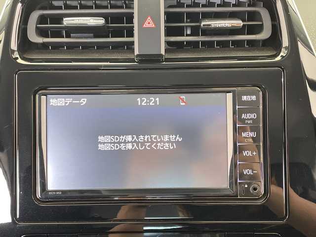 トヨタ プリウス A プレミアム 栃木県 2019(令1)年 2.3万km スティールブロンドM 純正ナビ/（CD/Bluetooth/USB/ワンセグTV）/バックカメラ/社外フルエアロ/トヨタセーフティセンス/クリアランスソナー/ブラインドスポットモニター/リヤクロストラフィックオートアラート/ヘッドアップディスプレイ/ビルトインETC/前後ドライブレコーダー/合皮シート/パワーシート/シートエアコン/シートヒーター/LEDヘッドライト/LEDフォグ/LEDデイライト/スマートキー/プッシュスタート/ステアリングスイッチ/革巻きステアリング/電動格納ミラー/純正アルミホイール/純正フロアマット