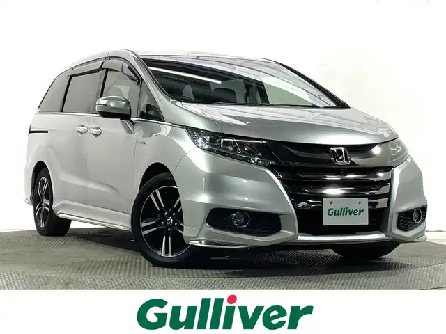 ホンダ オデッセイ ハイブリッド アブソルートセンシングアドバンP 大阪府 2016(平28)年 1.7万km スーパープラチナメタリック 純正ナビ(フルセグ/DVD再生/Bluetooth) 360カメラ ETC 両側パワースライドドア ハーフレザー パワーシート 衝突軽減 レーダークルコン レーンアシスト オートライト HDMI