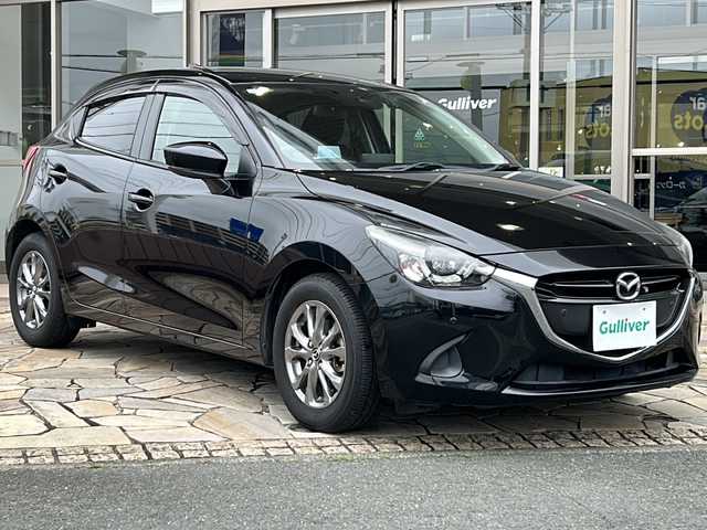 マツダ デミオ 15Sツーリング 静岡県 2019(平31)年 3.4万km ジェットブラックマイカ 純正ナビ/・AM/FM/・Stitcher/・aha/・Bluetooth/・USB/・CD/・AUX/・DVD/・フルセグTV/主要装備/・全方位カメラ/・ヘッドアップディスプレイ/・ドライブレコーダー/・ビルトインＥＴＣ/・コーナーセンサー/・ＢＳＭ/・ＬＥＤヘッドライト/・車線逸脱警報/・スマートシティブレーキサポート/・アイドリングストップ/・レーンキープアシスト/・シートヒーター/・サイドカーテンエアバッグ