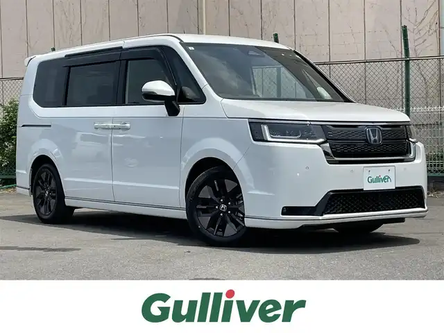 ホンダ ステップワゴン スパーダ eHEV 東京都 2024(令6)年 0.4万km プラチナホワイトパール 純正ナビ/バックモニター/衝突軽減ブレーキ/路外逸脱抑制/ブラインドスポット/パーキングセンサー/レーダークルーズ/シートヒーター/両側電動スライドドア/電動リアゲート/ETC/ドライブレコーダー