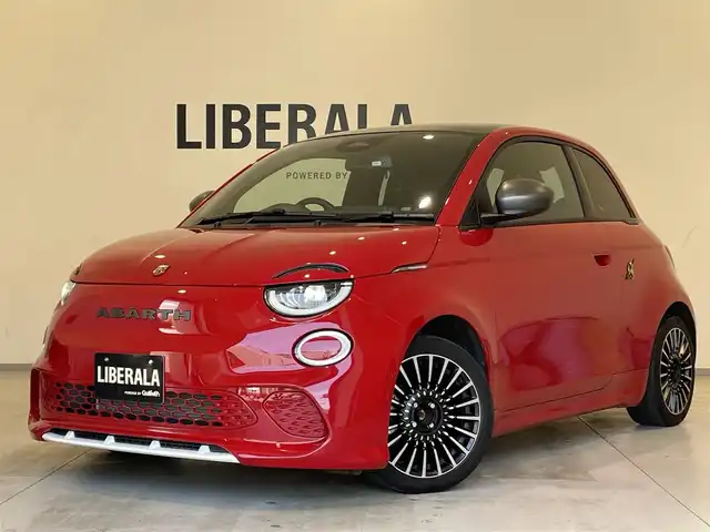 アバルト アバルト ５００ｅ ツーリズモ  ハッチバック 熊本県 2024(令6)年 0.8万km 赤 ・スマートキー/・プッシュスタート/・ガラスルーフ/・衝突軽減ブレーキ/・レーンセンス/・トラフィックサインアシスト/・前後パークセンス/・側面距離警告/・ブラインドスポットモニター/・ドライバーアテンションアラート/・自動ハイビーム/・前席シートヒーター /・純正メモリナビ/　【Bluetooth・USB・AppleCarPlay・AndroidAuto】/・バックカメラ/・ETC2.0/・LEDヘッドランプ