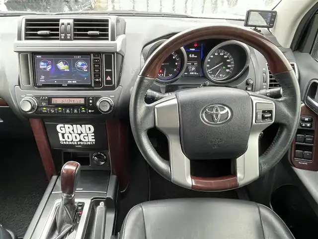 トヨタ ランドクルーザー プラド TX Lパッケージ 大阪府 2014(平26)年 6.9万km ホワイトパールクリスタルシャイン 社外ナビ　/   フルセグＴＶ/CD/DVD/Bluetooth　/バックモニター　/サンルーフ　/前席シートヒーター　/クルーズコントロール　/前席パワーシート/センターデフロック　/前方ドライブレコーダー/純正17インチアルミホイール　/ルーフレール　/プッシュスタート　/スマートキー　/ビルトインＥＴＣ