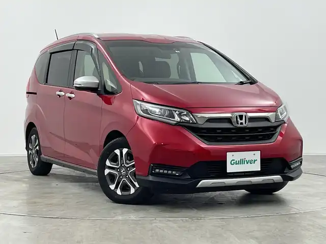 ホンダ フリード ハイブリット クロスター 群馬県 2022(令4)年 3.2万km プレミアムクリスタルレッドM 純正ナビ/Bluetooth/フルセグTV/CD/DVD/ホンダセンシング/シートヒーター/バックカメラ/両側パワースライドドア/前後ドライブレコーダー/ETC/LEDヘッドライト/コーナーセンサー（後方のみ）/純正AW/純正フロアマット/衝突被害軽減システム/レーンキープアシスト/オートライト/ハーフレザーシート/禁煙車