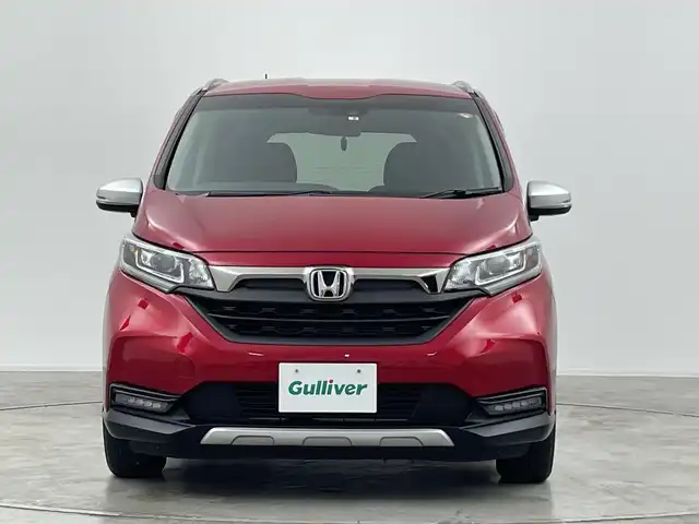 ホンダ フリード ハイブリット クロスター 群馬県 2022(令4)年 3.2万km プレミアムクリスタルレッドM 純正ナビ/Bluetooth/フルセグTV/CD/DVD/ホンダセンシング/シートヒーター/バックカメラ/両側パワースライドドア/前後ドライブレコーダー/ETC/LEDヘッドライト/コーナーセンサー（後方のみ）/純正AW/純正フロアマット/衝突被害軽減システム/レーンキープアシスト/オートライト/ハーフレザーシート/禁煙車