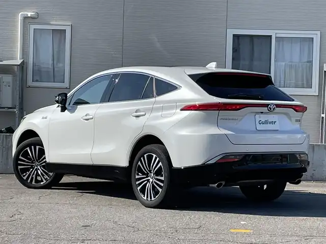 トヨタ ハリアー ＰＨＥＶ Z 青森県 2023(令5)年 2.8万km プラチナホワイトパールマイカ ワンオーナー/4WD/トヨタセーフティセンス/・プリクラッシュセーフティ/・レーントレーシングアシスト/・レーダークルーズコントロール/・アダプティブハイビームシステム/・ロードサインアシスト/・ドライバー異常対応システム/・プロアクティブドライビングアシスト/・発進遅れ告知機能/・ブラインドスポットモニター/・パーキングサポートブレーキ/純正ナビ/【AM/FM/BT/Miracast/USB】/フルセグTV/JBLサウンド/パノラミックビューモニター/調光パノラマルーフ/ステアリングヒーター/シートヒーター/エアーシート/パワーシート/寒冷地仕様/ETC2.0/純正19インチAW/取扱説明書/保証書