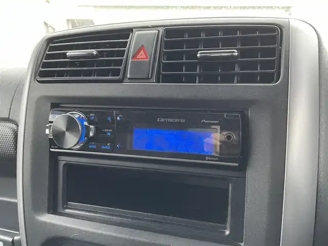 スズキ ジムニー XG 広島県 2008(平20)年 8.5万km スペリアホワイト ヒッチメンバー/SUZUKIロゴ16インチブラックAW/5MT/パートタイム4WD/ターボ/carrozzeriaオーディオ（AM/FM/Bluetooth）/LEDヘッドライト/フロアマット/キーレス/スペアキー