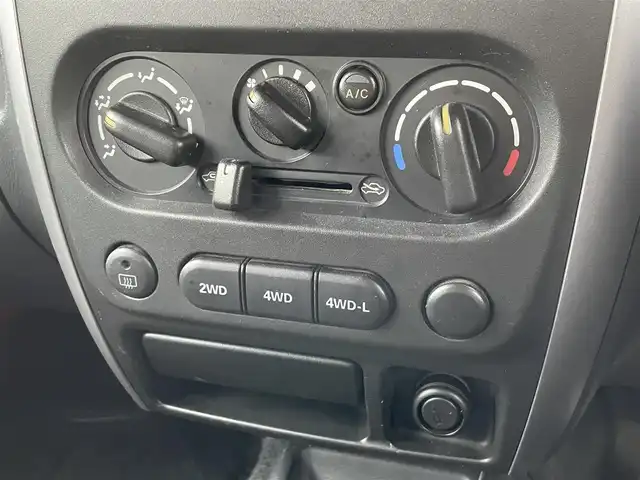 スズキ ジムニー XG 広島県 2008(平20)年 8.5万km スペリアホワイト ヒッチメンバー/SUZUKIロゴ16インチブラックAW/5MT/パートタイム4WD/ターボ/carrozzeriaオーディオ（AM/FM/Bluetooth）/LEDヘッドライト/フロアマット/キーレス/スペアキー