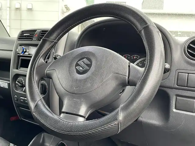 スズキ ジムニー XG 広島県 2008(平20)年 8.5万km スペリアホワイト ヒッチメンバー/SUZUKIロゴ16インチブラックAW/5MT/パートタイム4WD/ターボ/carrozzeriaオーディオ（AM/FM/Bluetooth）/LEDヘッドライト/フロアマット/キーレス/スペアキー