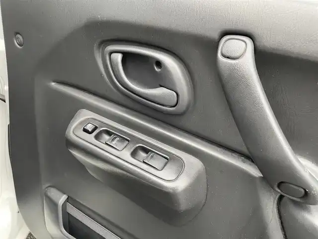 スズキ ジムニー XG 広島県 2008(平20)年 8.5万km スペリアホワイト ヒッチメンバー/SUZUKIロゴ16インチブラックAW/5MT/パートタイム4WD/ターボ/carrozzeriaオーディオ（AM/FM/Bluetooth）/LEDヘッドライト/フロアマット/キーレス/スペアキー