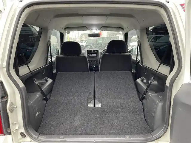 スズキ ジムニー XG 広島県 2008(平20)年 8.5万km スペリアホワイト ヒッチメンバー/SUZUKIロゴ16インチブラックAW/5MT/パートタイム4WD/ターボ/carrozzeriaオーディオ（AM/FM/Bluetooth）/LEDヘッドライト/フロアマット/キーレス/スペアキー