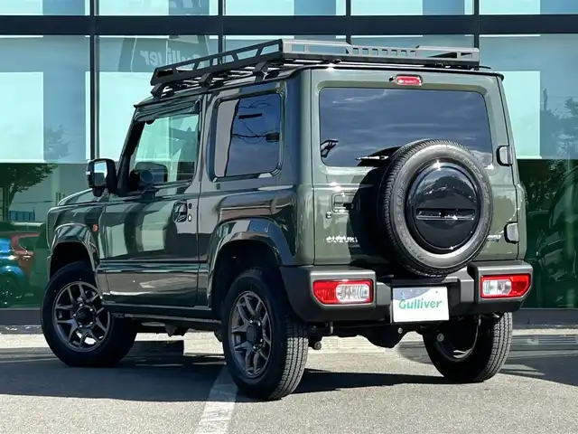 スズキ ジムニー XC 和歌山県 2020(令2)年 0.9万km ジャングルグリーン 衝突軽減ブレーキ/横滑り防止機能/アイドリングストップ/クルコン/シートヒーター/ダウンヒルアシストコントロール/シートカバー/パワーウインドウ/純正AW/ルーフラック/プッシュスタート/スマートキー