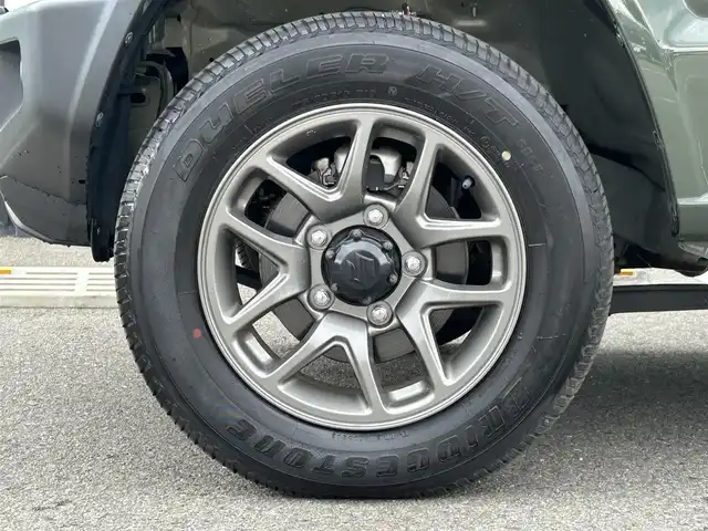 スズキ ジムニー XC 和歌山県 2020(令2)年 0.9万km ジャングルグリーン 衝突軽減ブレーキ/横滑り防止機能/アイドリングストップ/クルコン/シートヒーター/ダウンヒルアシストコントロール/シートカバー/パワーウインドウ/純正AW/ルーフラック/プッシュスタート/スマートキー