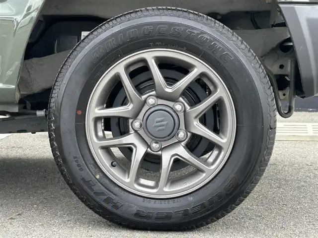 スズキ ジムニー XC 和歌山県 2020(令2)年 0.9万km ジャングルグリーン 衝突軽減ブレーキ/横滑り防止機能/アイドリングストップ/クルコン/シートヒーター/ダウンヒルアシストコントロール/シートカバー/パワーウインドウ/純正AW/ルーフラック/プッシュスタート/スマートキー