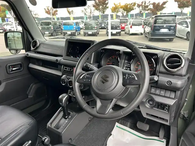 スズキ ジムニー XC 和歌山県 2020(令2)年 0.9万km ジャングルグリーン 衝突軽減ブレーキ/横滑り防止機能/アイドリングストップ/クルコン/シートヒーター/ダウンヒルアシストコントロール/シートカバー/パワーウインドウ/純正AW/ルーフラック/プッシュスタート/スマートキー