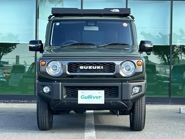 スズキ ジムニー XC 和歌山県 2020(令2)年 0.9万km ジャングルグリーン 衝突軽減ブレーキ/横滑り防止機能/アイドリングストップ/クルコン/シートヒーター/ダウンヒルアシストコントロール/シートカバー/パワーウインドウ/純正AW/ルーフラック/プッシュスタート/スマートキー