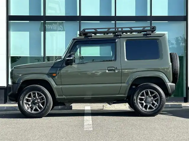 スズキ ジムニー XC 和歌山県 2020(令2)年 0.9万km ジャングルグリーン 衝突軽減ブレーキ/横滑り防止機能/アイドリングストップ/クルコン/シートヒーター/ダウンヒルアシストコントロール/シートカバー/パワーウインドウ/純正AW/ルーフラック/プッシュスタート/スマートキー