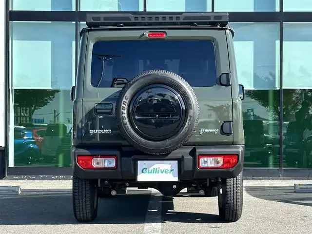 スズキ ジムニー XC 和歌山県 2020(令2)年 0.9万km ジャングルグリーン 衝突軽減ブレーキ/横滑り防止機能/アイドリングストップ/クルコン/シートヒーター/ダウンヒルアシストコントロール/シートカバー/パワーウインドウ/純正AW/ルーフラック/プッシュスタート/スマートキー