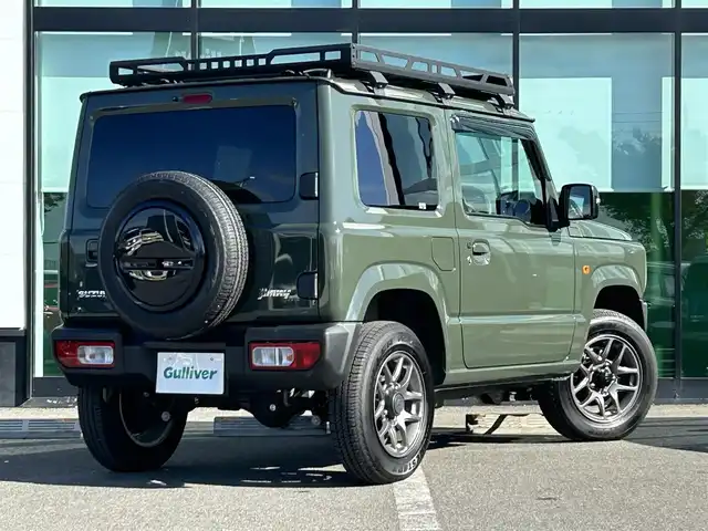 スズキ ジムニー XC 和歌山県 2020(令2)年 0.9万km ジャングルグリーン 衝突軽減ブレーキ/横滑り防止機能/アイドリングストップ/クルコン/シートヒーター/ダウンヒルアシストコントロール/シートカバー/パワーウインドウ/純正AW/ルーフラック/プッシュスタート/スマートキー