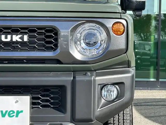 スズキ ジムニー XC 和歌山県 2020(令2)年 0.9万km ジャングルグリーン 衝突軽減ブレーキ/横滑り防止機能/アイドリングストップ/クルコン/シートヒーター/ダウンヒルアシストコントロール/シートカバー/パワーウインドウ/純正AW/ルーフラック/プッシュスタート/スマートキー