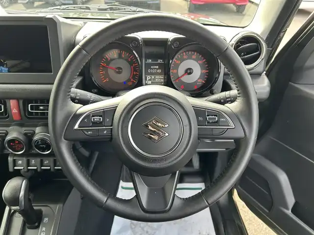 スズキ ジムニー XC 和歌山県 2020(令2)年 0.9万km ジャングルグリーン 衝突軽減ブレーキ/横滑り防止機能/アイドリングストップ/クルコン/シートヒーター/ダウンヒルアシストコントロール/シートカバー/パワーウインドウ/純正AW/ルーフラック/プッシュスタート/スマートキー