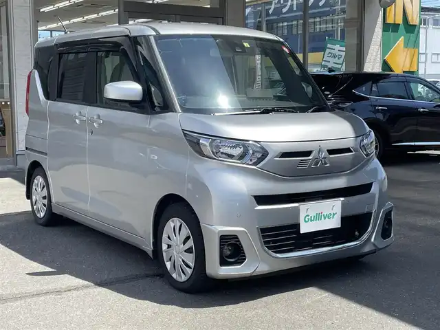 三菱 ｅＫスペース G 宮城県 2020(令2)年 2.2万km スターリングシルバーM 社外メモリーナビ/フルセグTV/(CD/BT)/バックカメラ/e-アシスト/・衝突被害軽減ブレーキアシスト/・踏み間違い衝突防止アシスト/・車線逸脱警報システム/・車線逸脱防止支援機能/・オートマチックハイビーム/・ふらつき警報/・前方衝突予測機能/・先行車発進通知/前後コーナーセンサー/片側パワースライドドア/前席シートヒーター/スマートキー/ETC/ライトレベライザー/電動格納式ミラー/保証書/スペアキー