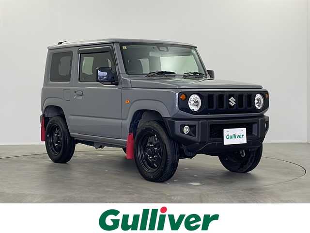 スズキ ジムニー XL 栃木県 2023(令5)年 2.6万km ミディアムグレー ワンオーナー/5MT/セーフティサポート/　デュアルカメラブレーキサポート/　ハイビームアシスト/　車線逸脱警報/　ふらつき警報/　先行車発進お知らせ/　標識認識/CDプレーヤー/ビルトインETC/シートヒーター(D/N席)/ハロゲンヘッドライト/フォグランプ/ドアバイザー/プッシュスタート/電動格納ドアミラー/スマートキー×2本/サイド+カーテンエアバッグ/保証書、取扱説明書付属